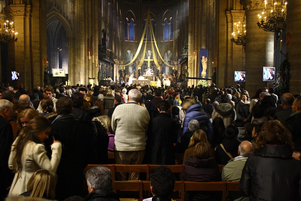 Midnight mass is one of the common Christmas traditions in France.