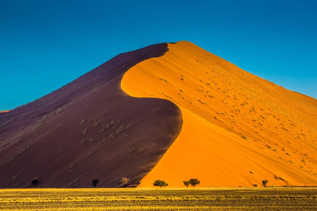 Namibia’s surreal sand dunes are iconic and breathtaking.