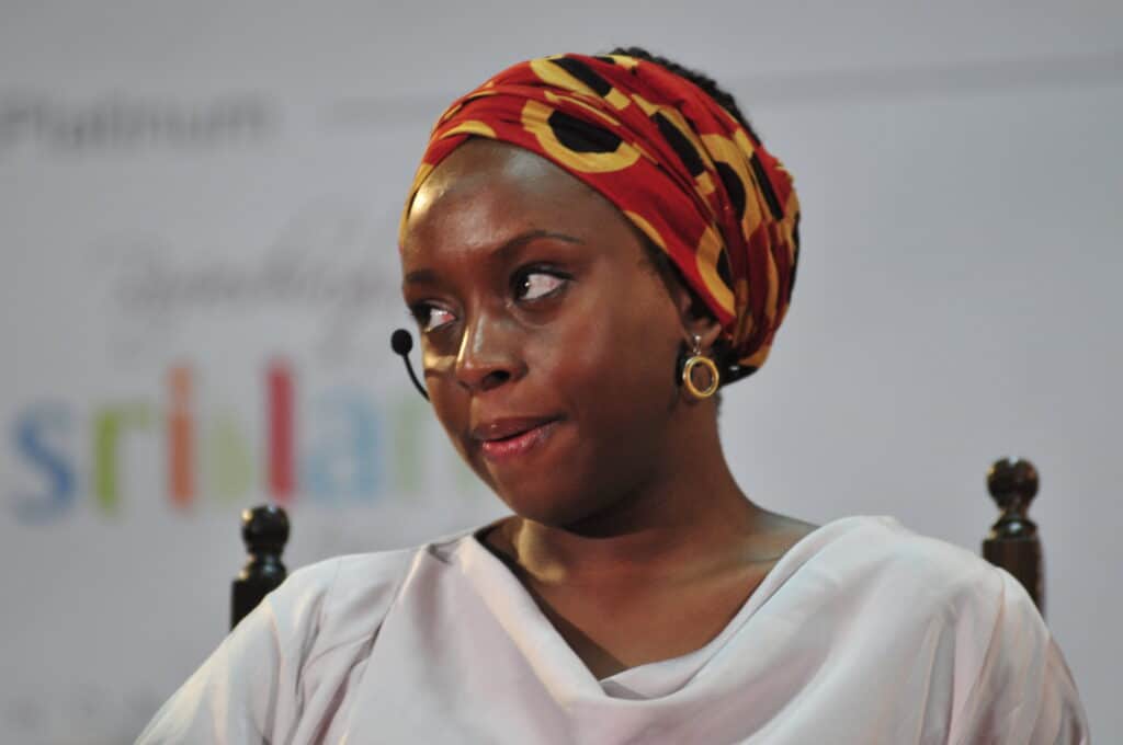 Chimamanda Ngozi Adichie speaking at an event.