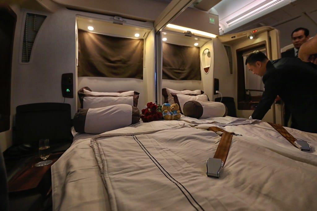 Picture of Singapore Airline first class suit, used to explain which has better Luxury Showdown: Orient Express 1900s vs. Singapore Airlines 2024.